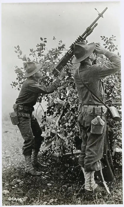 Framed Print : Soldier Aiming Antiaircraft Gun with Buddy Using Binoculars