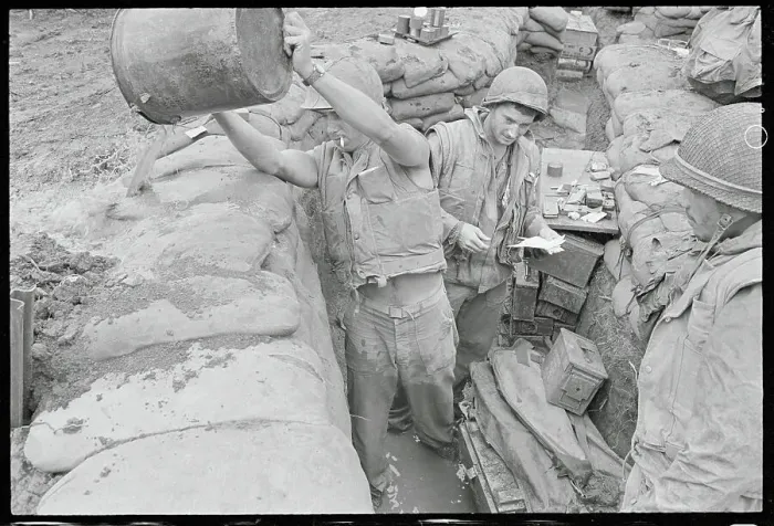 Framed Print : Soldier Bailing Water Out of His Trench Framed Print : Soldier Bailing Water Out of His Trench