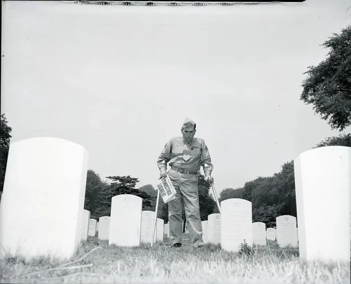 Framed Print : Soldier In Cemetery With Newspaper Framed Print : Soldier In Cemetery With Newspaper