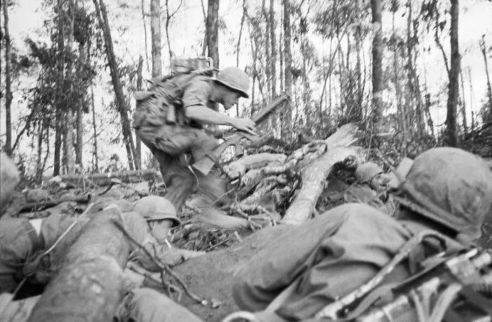 Framed Print : Soldier Dodging Through Maze Of Jungle Framed Print : Soldier Dodging Through Maze Of Jungle