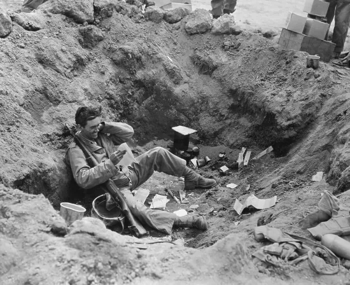 Framed Print : Soldier in Dugout Reading Letter
