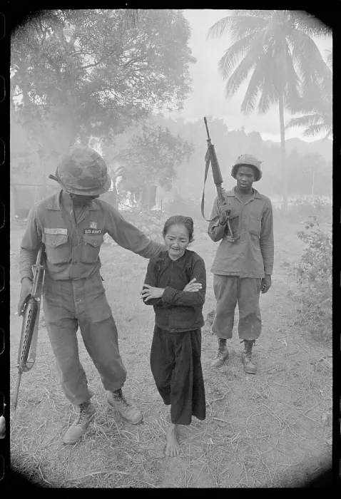 Framed Print : Soldier Escorting a Vietnamese Woman Framed Print : Soldier Escorting a Vietnamese Woman
