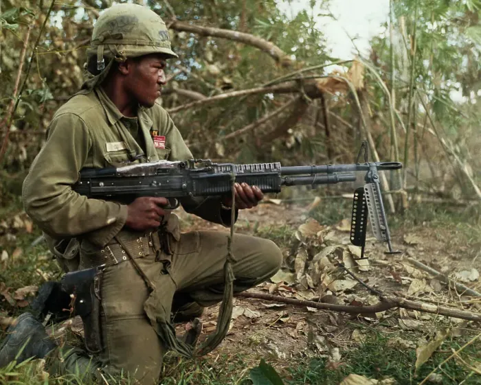 Framed Print : Soldier Firing His Machine Gun