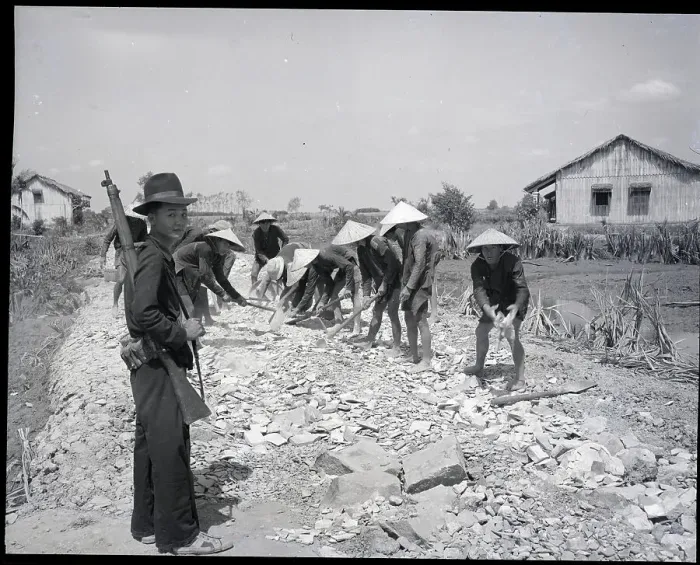 Framed Print : Soldier Guarding Farmers Building Road Framed Print : Soldier Guarding Farmers Building Road