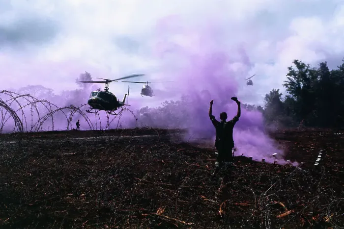 Framed Print : Soldier Guiding Helicopters into Landing Zone, Cambodia 1970