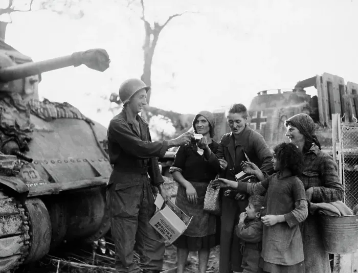 Framed Print : US Soldier Handing Out Army Rations Framed Print : US Soldier Handing Out Army Rations