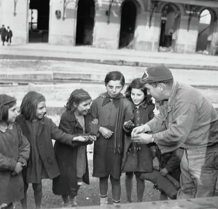 Framed Print : A Soldier Handing Out Sweets