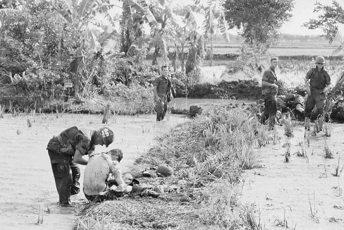 Framed Print : Soldier Helping to Remove Booby Traps Framed Print : Soldier Helping to Remove Booby Traps