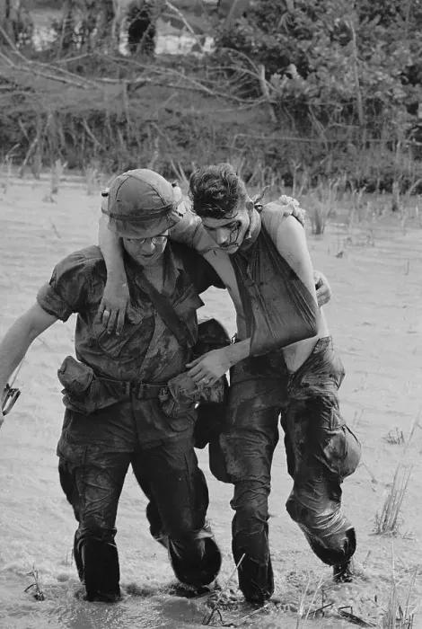 Framed Print : Soldier Helping Wounded Soldier to Safety Framed Print : Soldier Helping Wounded Soldier to Safety