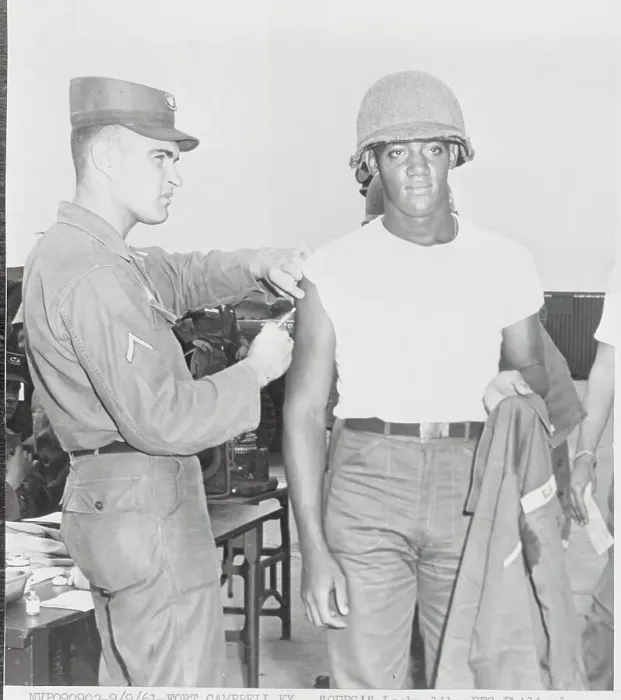 Framed Print : Soldier Inoculating a New Troop Framed Print : Soldier Inoculating a New Troop