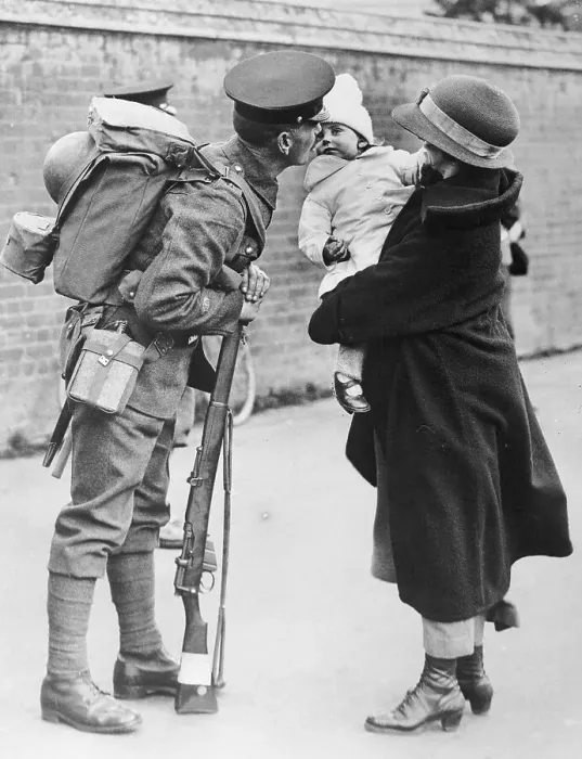 Framed Print : Soldier Kissing a Baby Framed Print : Soldier Kissing a Baby