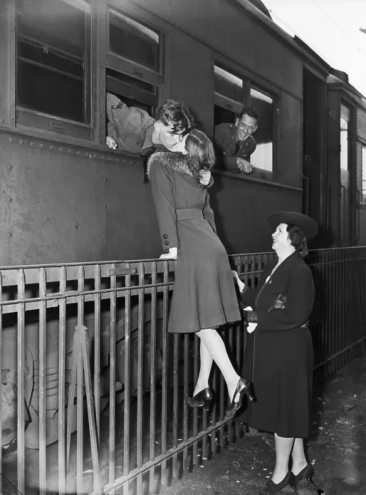Framed Print : Soldier Kissing Girlfriend Goodbye
