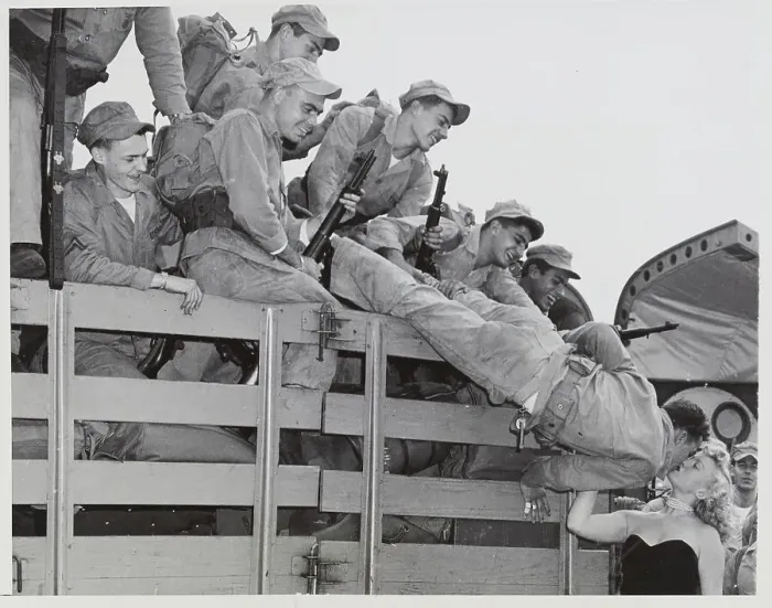 Framed Print : Soldier Leaning Over Truck to Kiss Lady