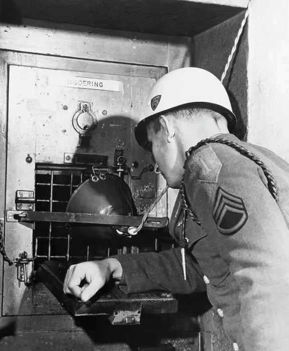 Framed Print : Soldier Peering into Goering's Cell Framed Print : Soldier Peering into Goering's Cell