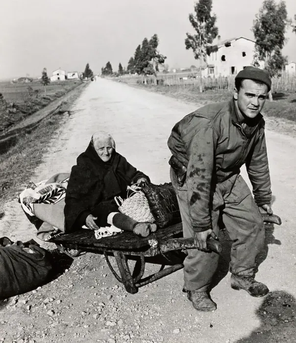 Framed Print : Soldier Pulling Woman On Stretcher Framed Print : Soldier Pulling Woman On Stretcher