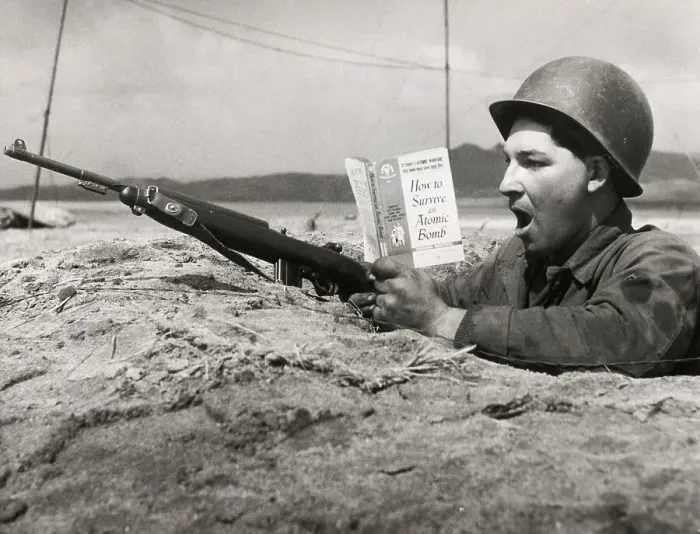 Framed Print : US Soldier Reading In Foxhole Framed Print : US Soldier Reading In Foxhole