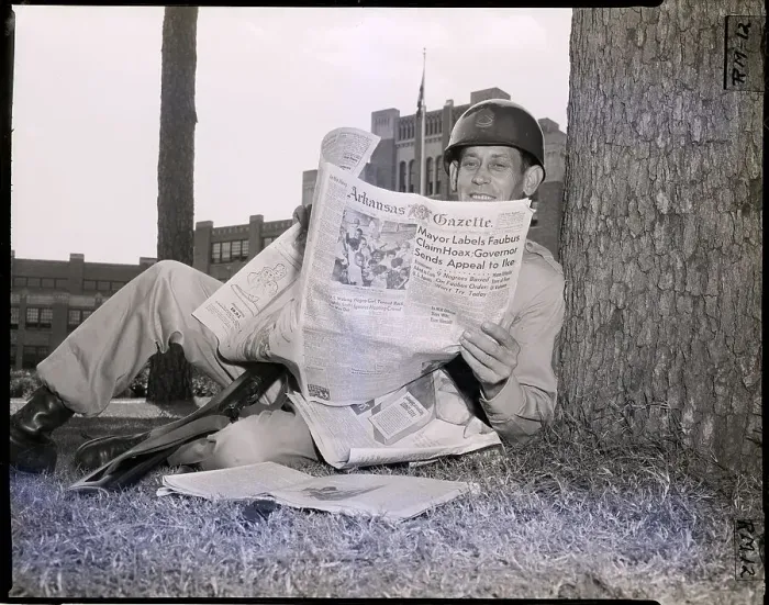 Framed Print : Soldier Reads Paper on Tree Framed Print : Soldier Reads Paper on Tree