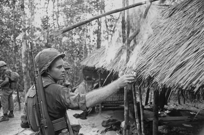 Framed Print : Soldier Setting Hut on Fire Framed Print : Soldier Setting Hut on Fire