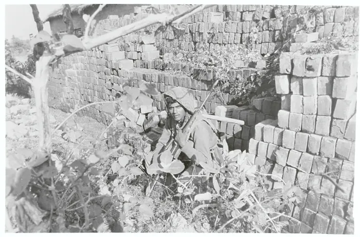 Framed Print : Soldier Sheltering near Wall Framed Print : Soldier Sheltering near Wall