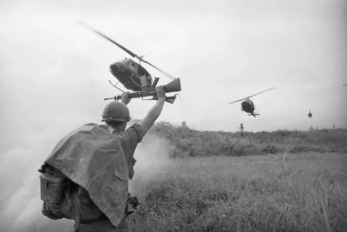 Framed Print : Soldier Signaling to Helicopter Framed Print : Soldier Signaling to Helicopter