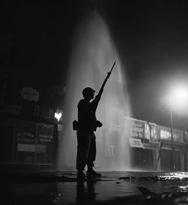 Framed Print : Soldier Silhouetted By Hydrant Spray Framed Print : Soldier Silhouetted By Hydrant Spray