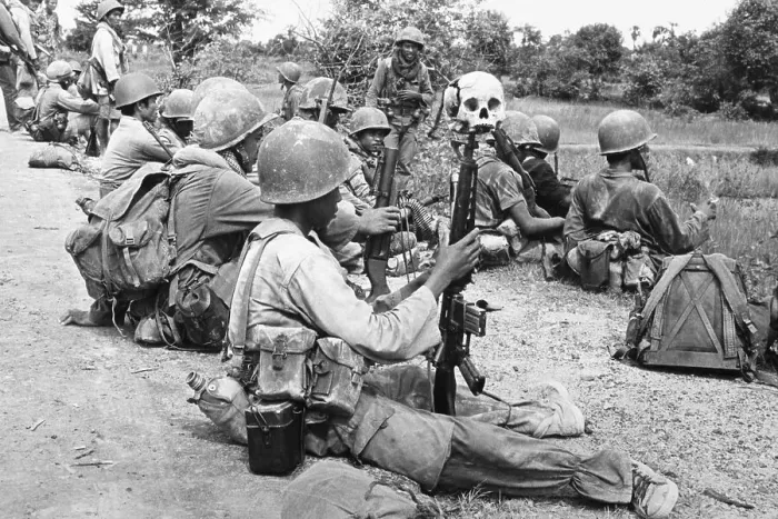 Framed Print : Soldier With Skull Draped M-16 Rifle