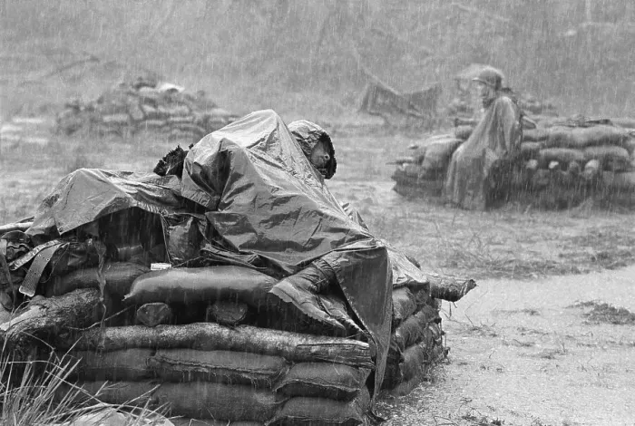 Framed Print : Soldier Sleeping During Downpour in Vietnam Framed Print : Soldier Sleeping During Downpour in Vietnam