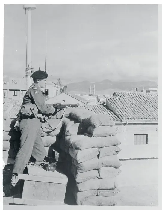 Framed Print : Soldier Standing Behind Barricade Framed Print : Soldier Standing Behind Barricade