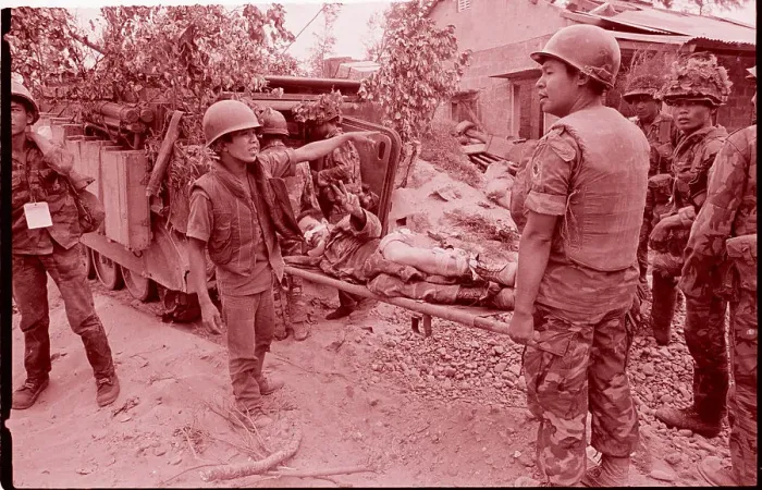 Framed Print : Soldier on Stretcher Gives Peace Sign Framed Print : Soldier on Stretcher Gives Peace Sign