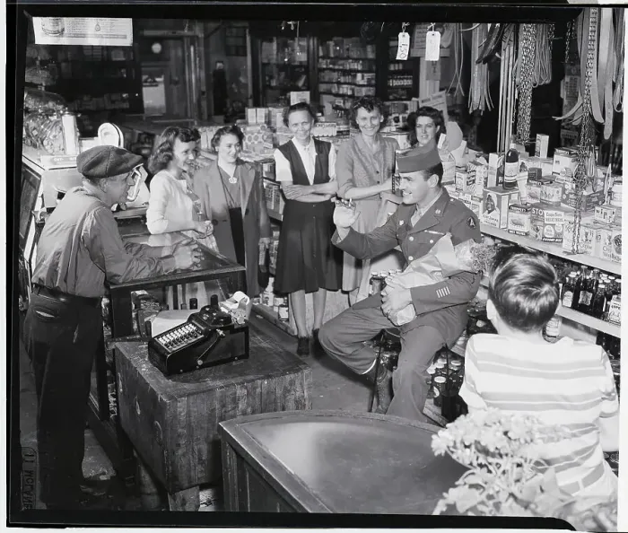 Framed Print : Soldier Tells War Stories At Store Framed Print : Soldier Tells War Stories At Store
