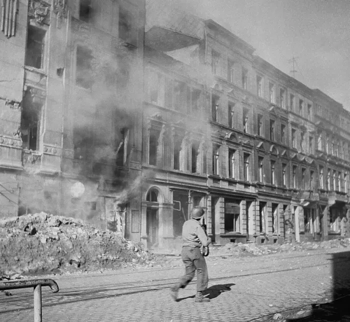 Framed Print : Soldier Trekking Cautiously Through Aachen