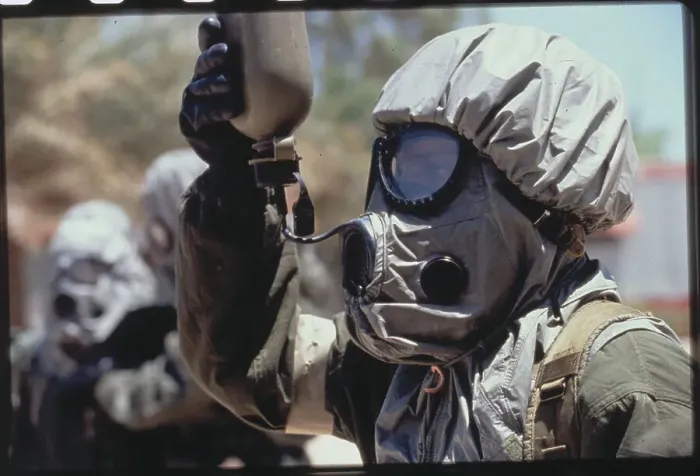 Framed Print : Soldier Utilizing Gas Mask Uniform Framed Print : Soldier Utilizing Gas Mask Uniform
