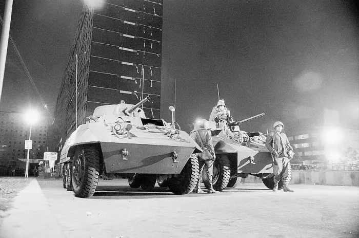 Framed Print : Soldiers with Armored Vehicles Watch for Sniper Framed Print : Soldiers with Armored Vehicles Watch for Sniper