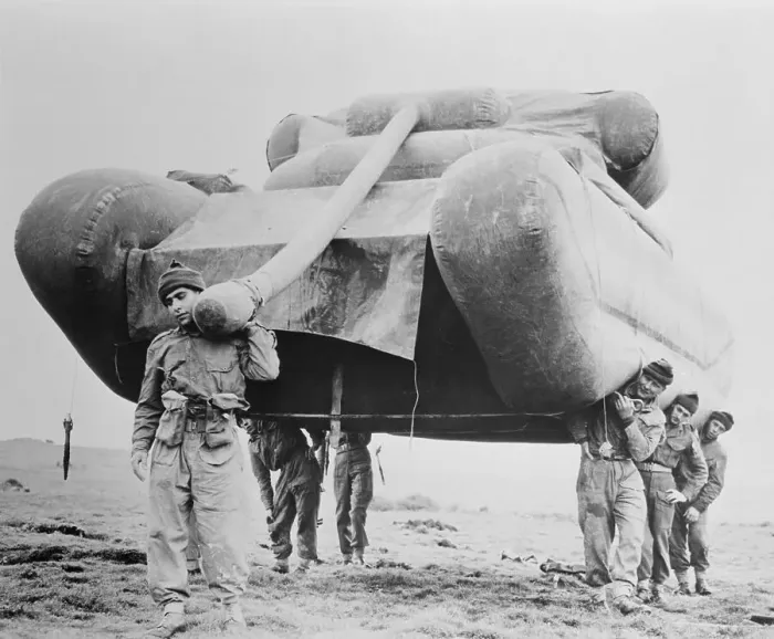 Framed Print : Soldiers Carrying an Inflatable Tank Framed Print : Soldiers Carrying an Inflatable Tank