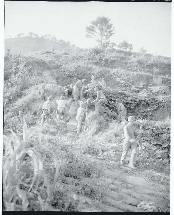 Framed Print : Soldiers Carrying the Wounded Down Terrain