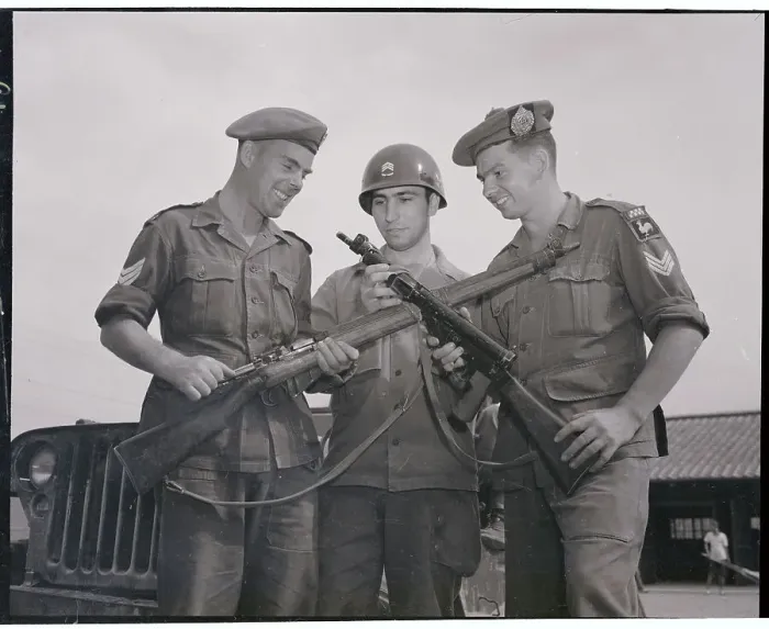 Framed Print : Soldiers Comparing Their Weapons Framed Print : Soldiers Comparing Their Weapons