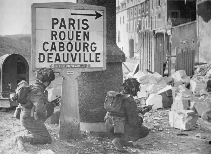 Framed Print : Soldiers Crouching Under Sign Framed Print : Soldiers Crouching Under Sign