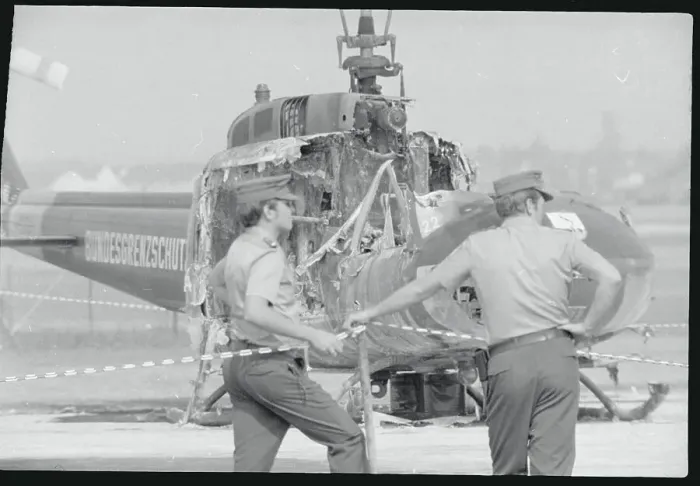 Framed Print : Soldiers by Damaged Helicopter Framed Print : Soldiers by Damaged Helicopter