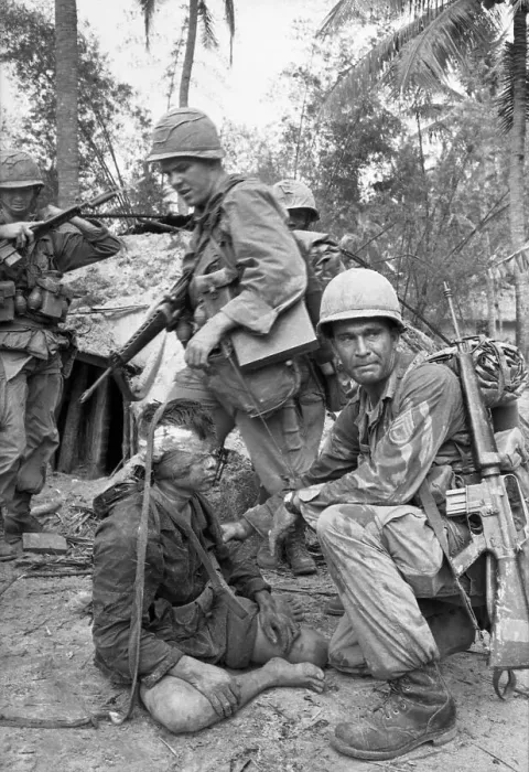 Framed Print : Soldiers Dragging Vietcong from Bunker Framed Print : Soldiers Dragging Vietcong from Bunker
