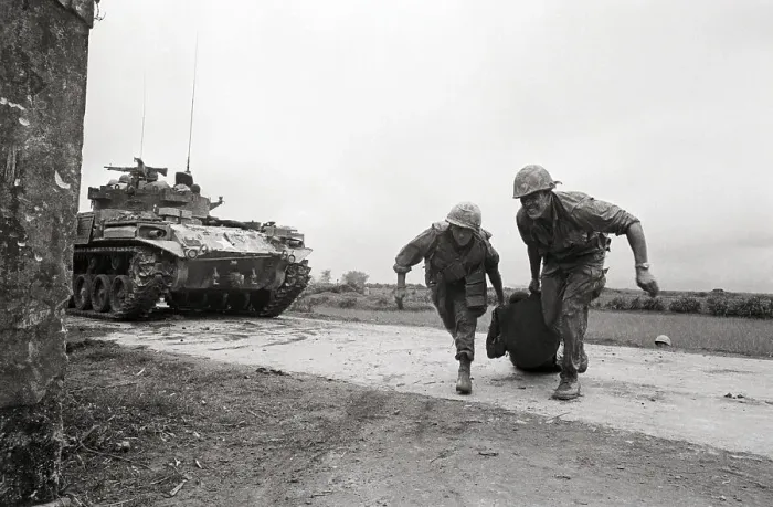 Framed Print : Soldiers Dragging Wounded Gi Across Road Framed Print : Soldiers Dragging Wounded Gi Across Road