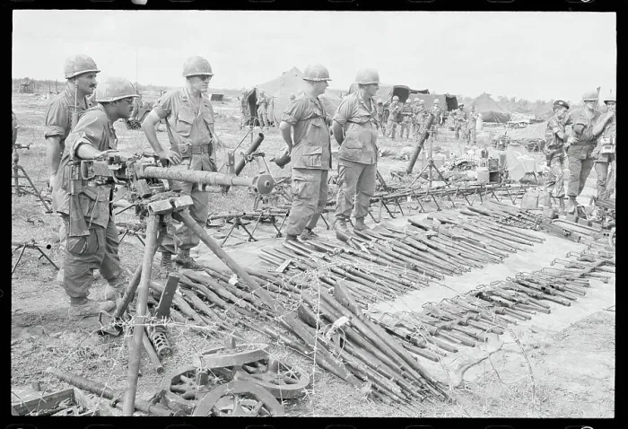 Framed Print : Soldiers Examining Captured Weapons Framed Print : Soldiers Examining Captured Weapons
