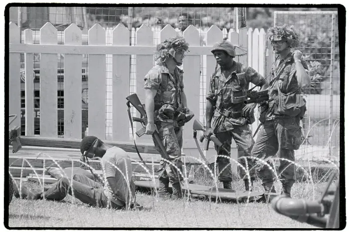 Framed Print : US Soldiers Guarding Prisoner