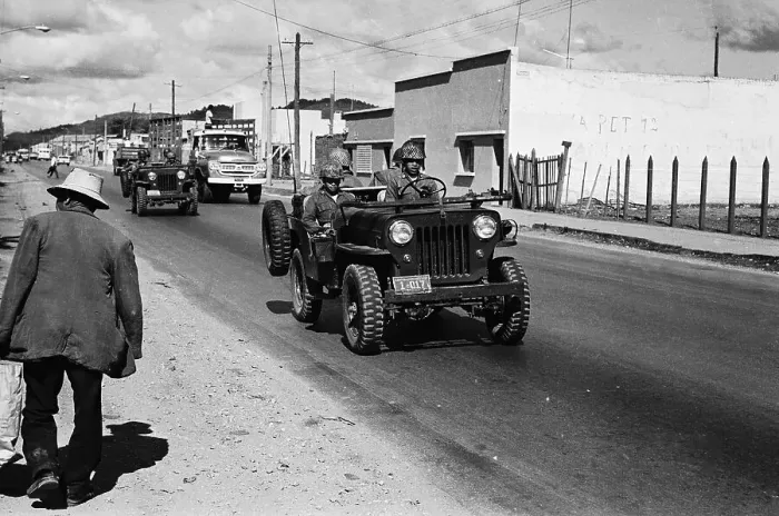 Framed Print : Soldiers in Jeeps Patrolling Street Framed Print : Soldiers in Jeeps Patrolling Street