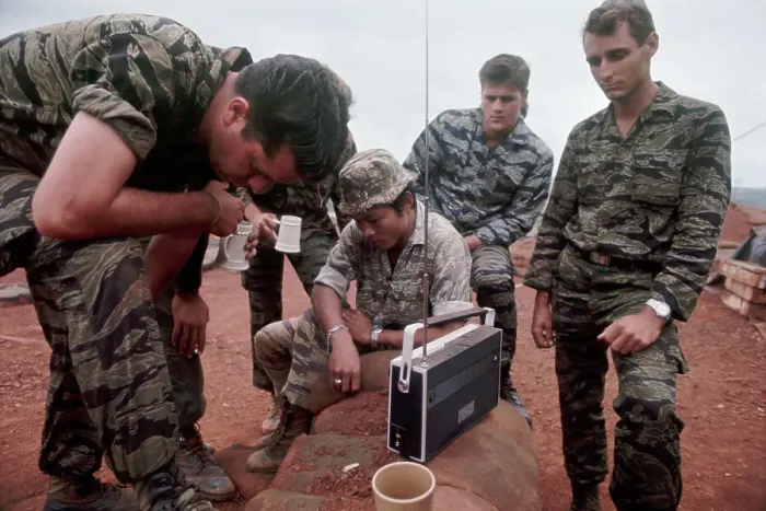 Framed Print : Soldiers Listening to Portable Radios Framed Print : Soldiers Listening to Portable Radios