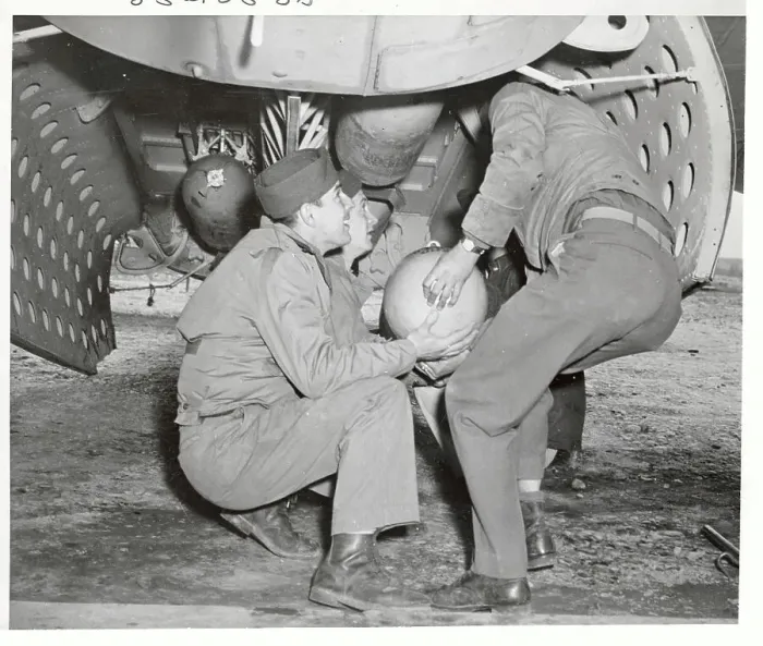 Framed Print : Soldiers Loading Bomb into Bay of Bomber Plane Framed Print : Soldiers Loading Bomb into Bay of Bomber Plane