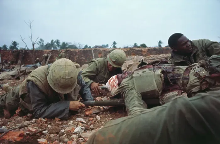Framed Print : Soldiers Moving One of Their Wounded Framed Print : Soldiers Moving One of Their Wounded