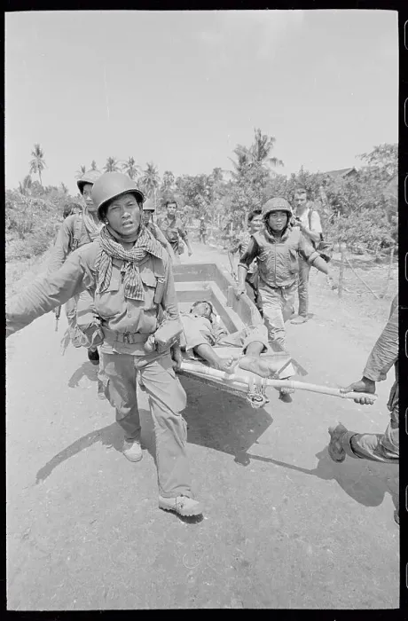 Framed Print : Soldiers Pulling Wounded Comrade Framed Print : Soldiers Pulling Wounded Comrade