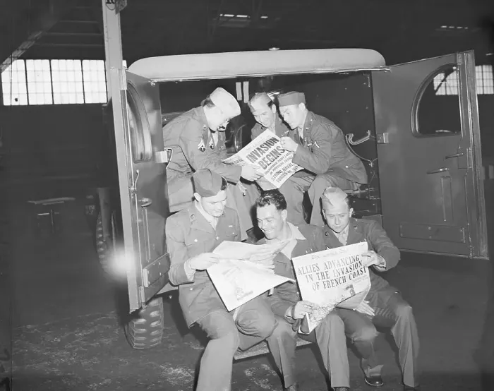 Framed Print : Soldiers Reading About D-Day Framed Print : Soldiers Reading About D-Day