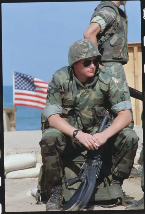Framed Print : Soldiers Relaxing near American Flag Framed Print : Soldiers Relaxing near American Flag