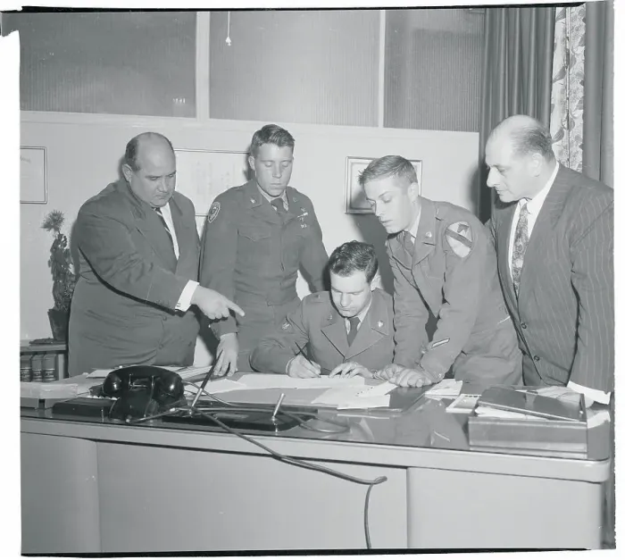 Framed Print : US Soldiers Signing Papers Framed Print : US Soldiers Signing Papers